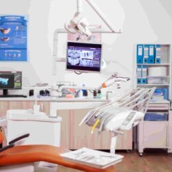 dental-clinic-interior-with-modern-dentistry-equipment-orange-color-stomatology-cabinet-with-nobody-it-orange-equipment-oral-treatment-min-min (1)-min