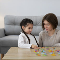 mother-girl-playing-game-medium-shot (1)