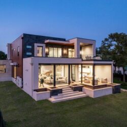 Zbranek_Holt_LakeLBJ_Modern_Luxury_Lakehouse_Elevated_View_Glass_Walls_Terrace_Seating-2-720x480