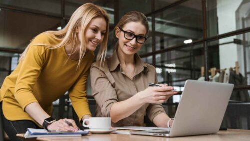 young-smiley-businesswomen-working-with-laptop-desk (1) young-smiley-businesswomen-working-with-laptop-desk (1)