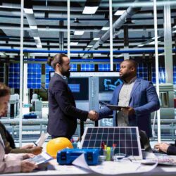 compressed_industrial-plant-managers-greet-investors-doing-handshake-showcasing-product