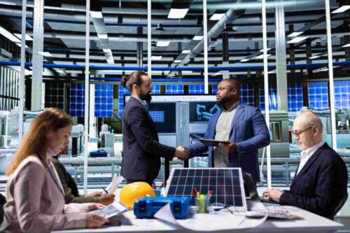 compressed_industrial-plant-managers-greet-investors-doing-handshake-showcasing-product compressed_industrial-plant-managers-greet-investors-doing-handshake-showcasing-product