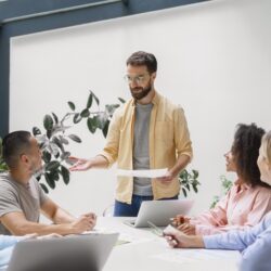 people-working-tech-brand-together