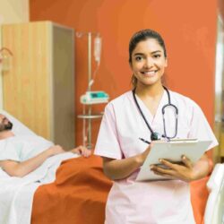 confident-female-doctor-with-reports-clipboard-standing-against-male-patient-hospital_11zon (1)