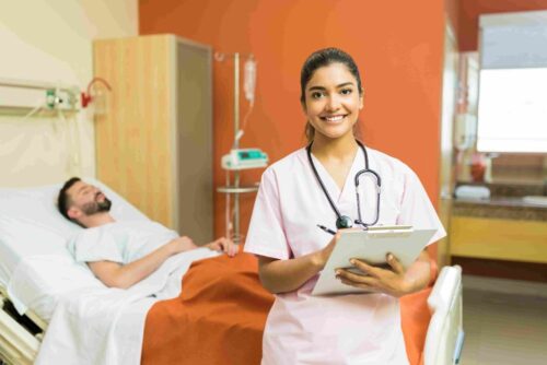 confident-female-doctor-with-reports-clipboard-standing-against-male-patient-hospital_11zon (1) confident-female-doctor-with-reports-clipboard-standing-against-male-patient-hospital_11zon (1)