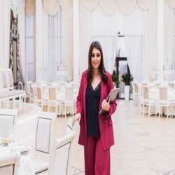 event-manager-with-laptop-banquet-hall