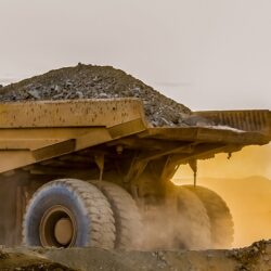 large-truck-carrying-sand-platinum-mining-site-africa