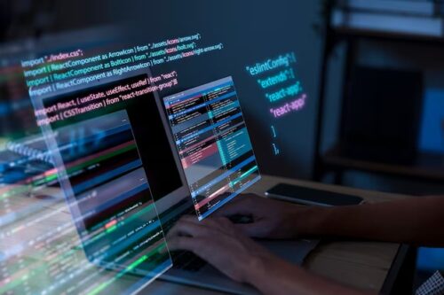 imgi_311_programming-background-with-person-working-with-codes-computer_23-2150010125