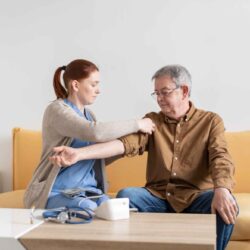 medium-shot-nurse-checking-man (2)