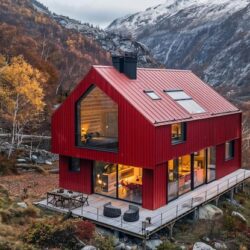 house-is-made-red-wood-has-glass-roof-that-says-home-is-made-steel_997657-44233